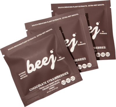 Three packages of beej BJ Gummies with chocolate strawberries flavor on a white background